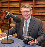 Commissioner McNamee with microphone