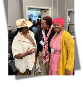 Image of three women speaking to each other 