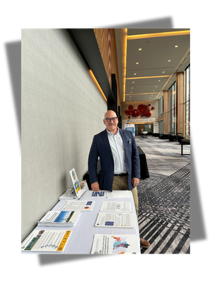 Man standing next to a table