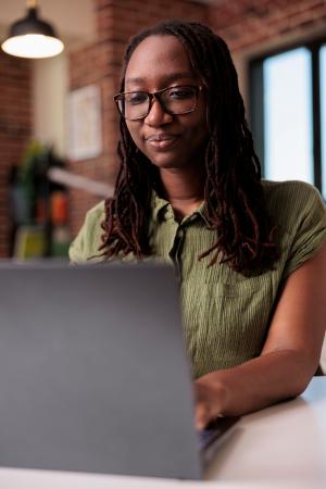 Woman typing on a keyboard 